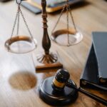 judges desk with gavel and scales