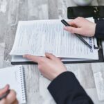 a person holding a document